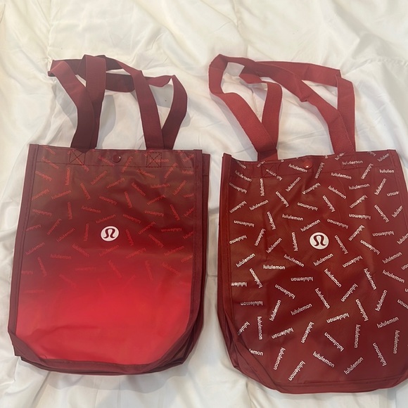 lululemon athletica Other - 2 new Lululemon red smaller bags